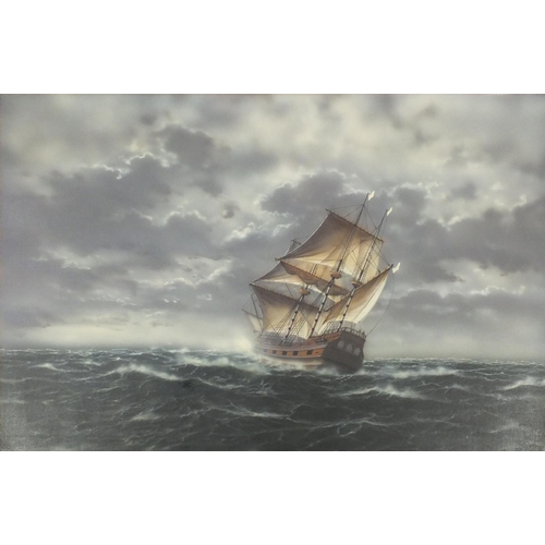 374 - Rigged ship on stormy seas, print in colour on canvas, mounted and framed, 90cm x 60cm