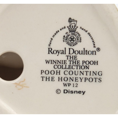 220 - Royal Doulton cat and Pooh counting the honey pots from The Winnie the Pooh Collection WP12, the lar... 