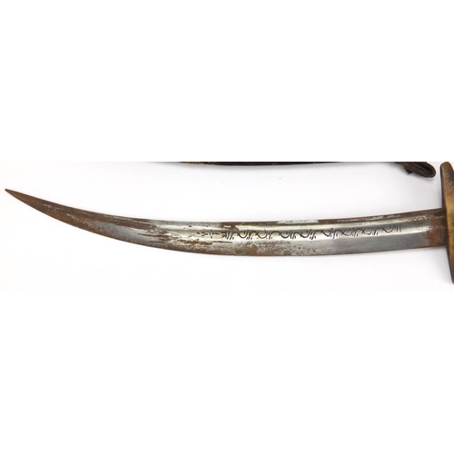 1016 - Middle Eastern dagger with horn handle and leather sheath, 44.5cm in length