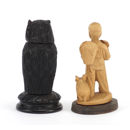 746 - Carved wooden owl and a Chinese figure of a young boy, the largest 12.5cm high