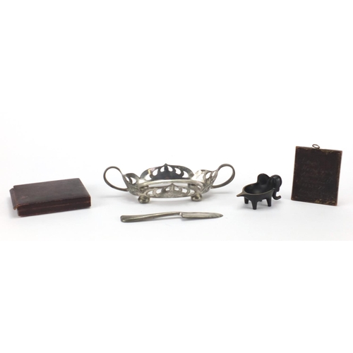 697 - Miscellaneous items including an Art Nouveau English pewter stand and a bronze elephant with registe... 