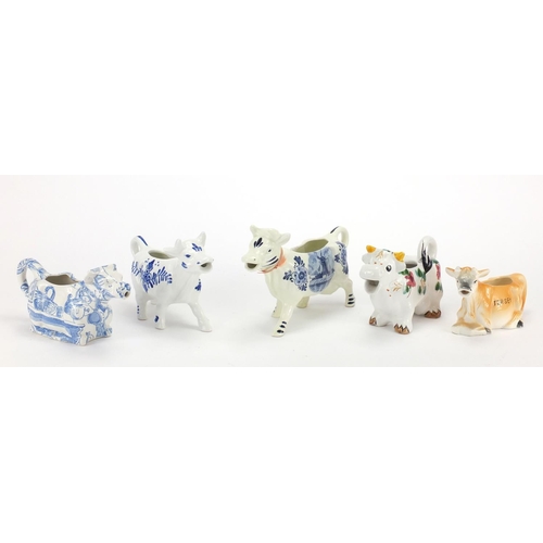 181 - Five Jersey cow creamerS including Delft, the largest 18.5cm in length