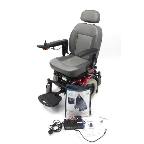 87 - Shoprider electric mobility chair with charger, related paperwork and power cape