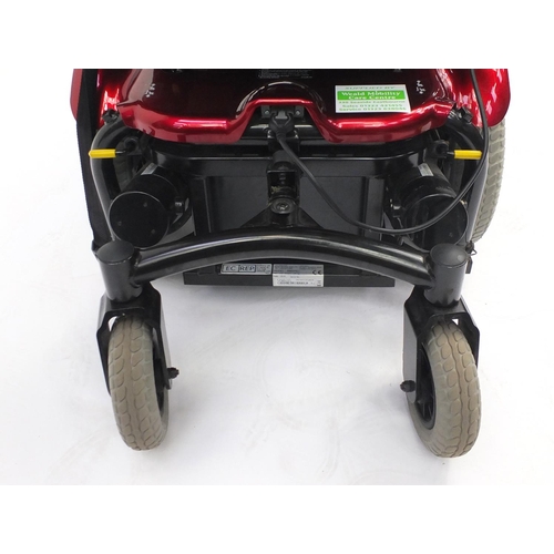 87 - Shoprider electric mobility chair with charger, related paperwork and power cape