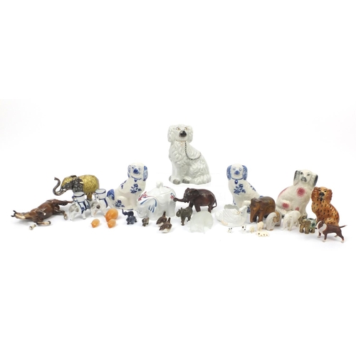 842 - Model animals including Staffordshire style spaniels, Beswick horse and Indian elephants