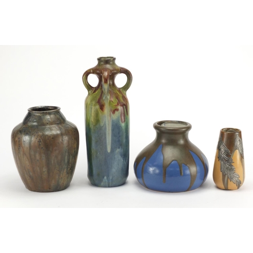 2220 - Four continental art pottery vases including two with floral metal overlay and one with four handles... 