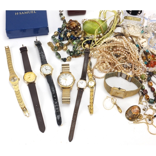 318 - Costume jewellery including necklaces, wristwatches, rings and brooches