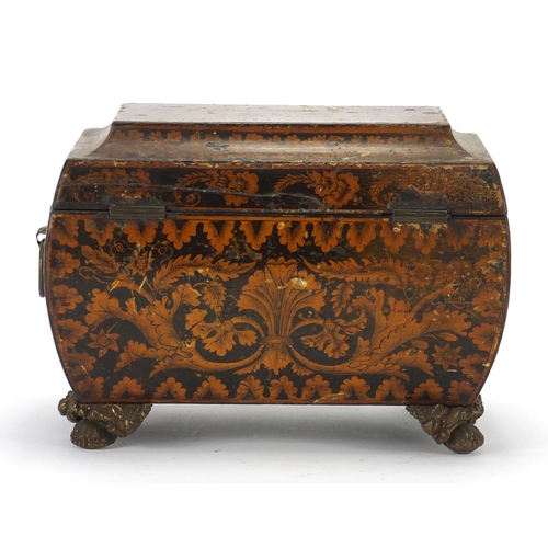32 - Regency penwork sarcophagus tea caddy, the hinged lid opening to reveal a lidded twin divisional int... 