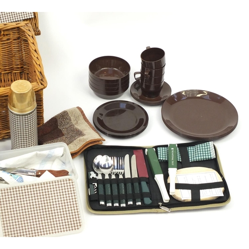 107 - 1950's/60's wicker picnic hamper and contents, 66cm wide