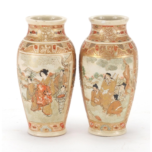 745 - Pair of Japanese Satsuma baluster vases, decorated with figures, 15cm high