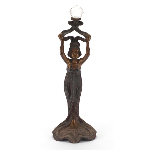 129 - Art Nouveau style Spelter figurine wearing a dress, 41cm high