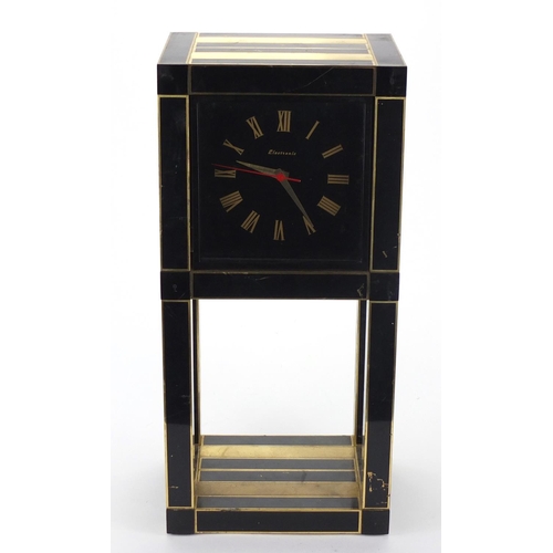 138 - Vintage black and gold painted metal electronic mantel clock, 51cm high