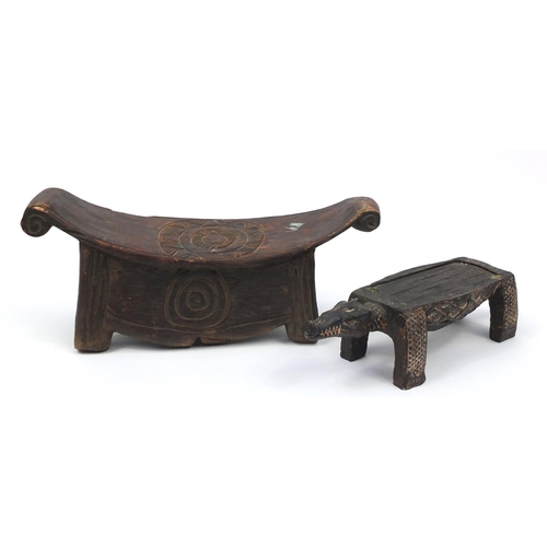 102 - African carved hardwood head rest and a stool, in the form of an alligator, the largest 62cm in leng... 