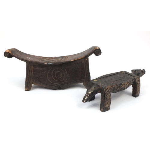 102 - African carved hardwood head rest and a stool, in the form of an alligator, the largest 62cm in leng... 
