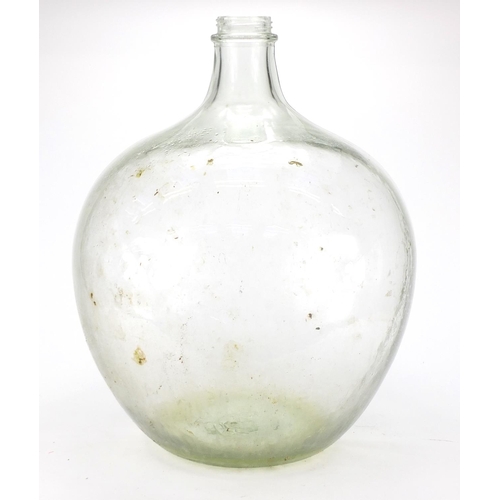 410 - Large green glass carboy, approximately 57cm high