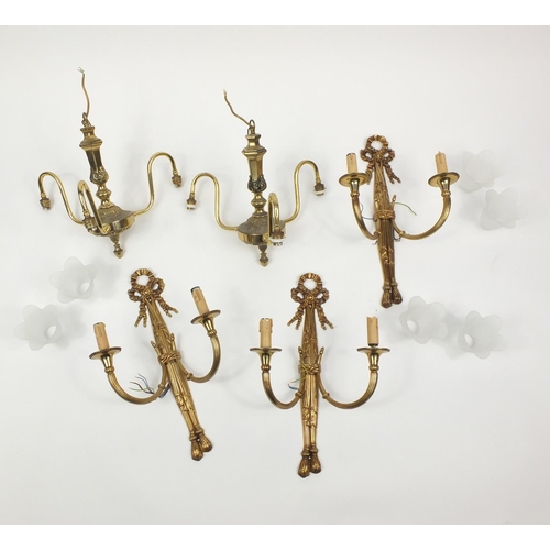 272 - Pair of brass three branch chandeliers and three wall sconces with glass shades