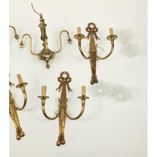 272 - Pair of brass three branch chandeliers and three wall sconces with glass shades