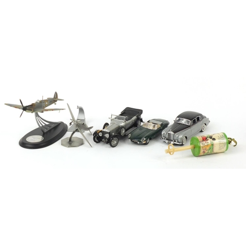 426 - Die cast vehicles and aeroplanes including Franklin Mint and a vintage Mickey Mouse rattle