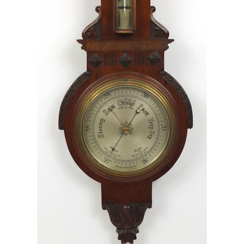 48 - Mahogany aneroid barometer with silvered dial, 90cm in length