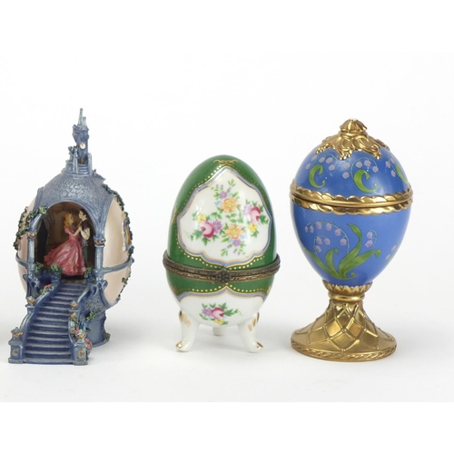 702 - Five egg trinkets including House of Faberge and Enchanted Waltz