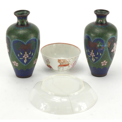 750 - Chinese porcelain tea bowl and saucer and a pair of cloisonné vases enamelled with flowers