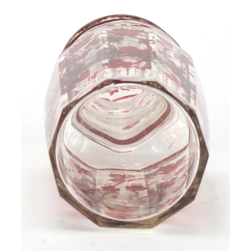 526 - Bohemian style red flashed cut glass jar and cover, 16cm high