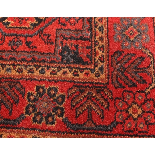 119 - Two geometric pattern carpet runners, the largest 190cm x 70cm
