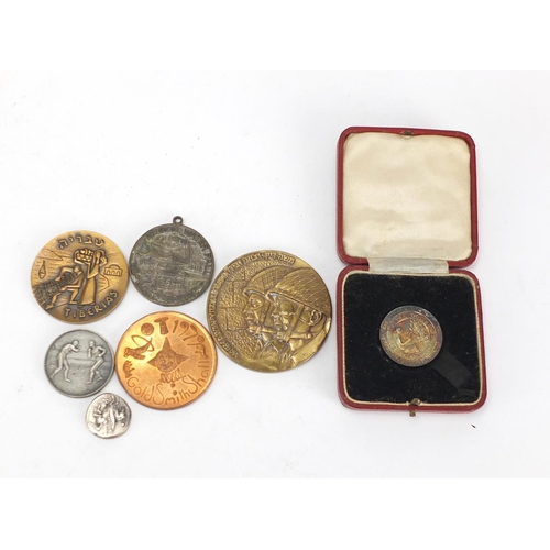 496 - Medallions including commemorative, sporting and a silver Poetry Society example