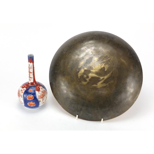 528 - Japanese Imari bottle vase and a Chinese brass shallow bowl engraved with a dragon, 30cm in diameter