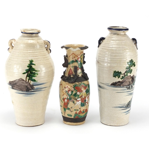 150 - Three Chinese stoneware vases, hand painted with landscapes and warriors, the largest 32cm high