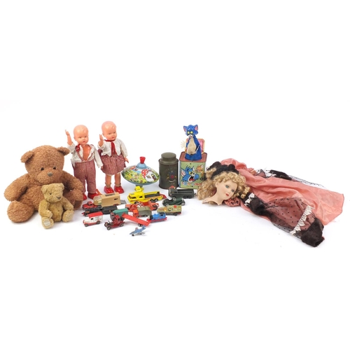 276 - Vintage and later toys including a bisque head doll, teddy bears and clock work walking dolls