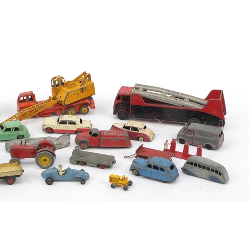 295 - Mostly Dinky die cast vehicles, including racing car and tractor