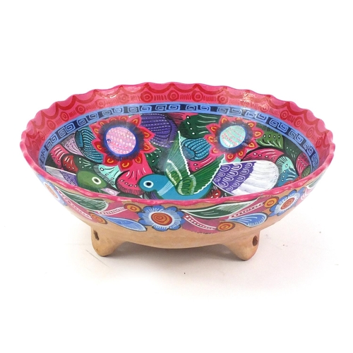 251 - Native American terracotta three footed bowl, hand painted with birds and a rabbit, 29cm in diameter