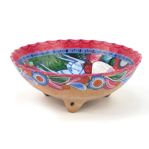 251 - Native American terracotta three footed bowl, hand painted with birds and a rabbit, 29cm in diameter