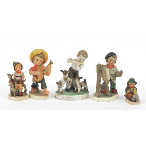 202 - Hand painted German figures of children including two Goebel, the largest 16cm high