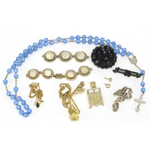 342 - Costume jewellery including a filigree metal bracelet set with cabochon stones, silver bracelet and ... 