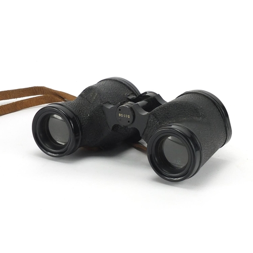 1002 - Pair of Military interest binoculars inscribed US Navy Buships MKXXXIII 1943 with leather case