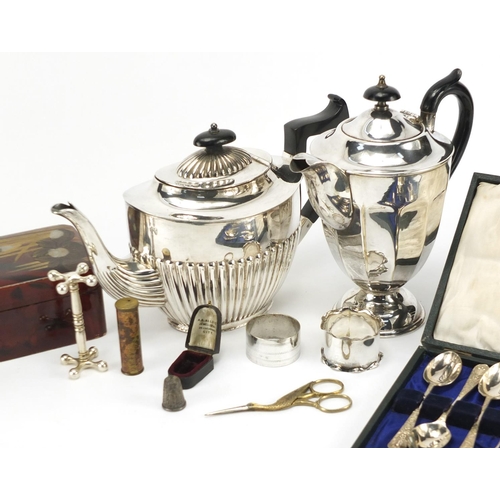 294 - Miscellaneous items including silver plated teapots, Japanese lacquered pen box and a silver napkin ... 