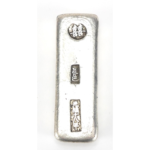 622 - Chinese silver coloured metal scroll weight, 8cm wide, approximate weight 168.8g