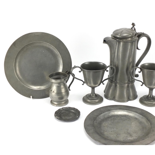 422 - Antique and later pewter including a water pot and measures