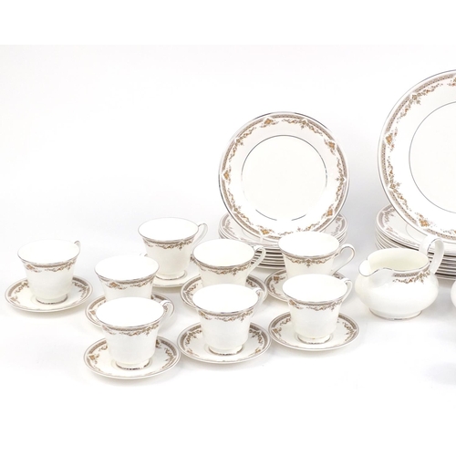 853 - Royal Doulton Repton pattern dinner and teawares including dinner plates and trios