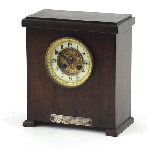 532 - Oak mantel clock with gilt dial, enamelled chapter ring and silver presentation label, 27cm high