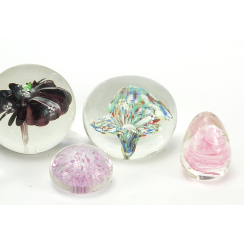 460 - Seven colourful glass paperweights