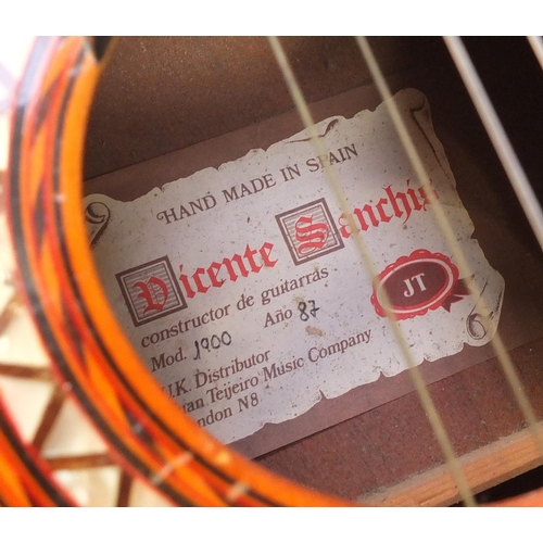 174 - Wooden acoustic guitar, with Vicente Sanchis paper label to the interior and protective carry case