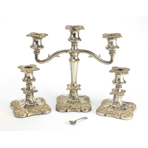 197 - Silver plated three branch candelabra, pair of matching candlesticks, rose bowl and carved ebony lio... 