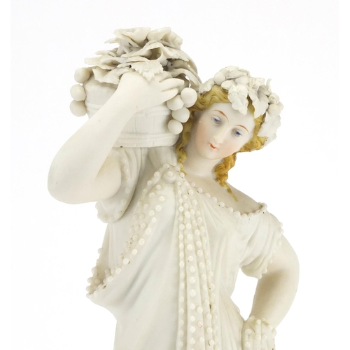 160 - Bisque figurine carrying a basket of flowers, 33cm high