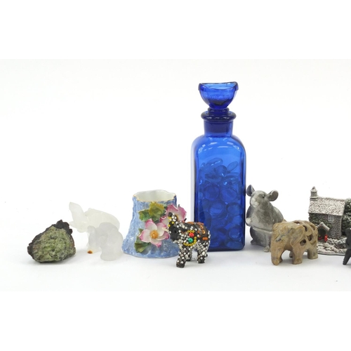 533 - Miscellaneous items including a Wyeth eye bath bottle, Royal Worcester vase and carved soapstone ele... 