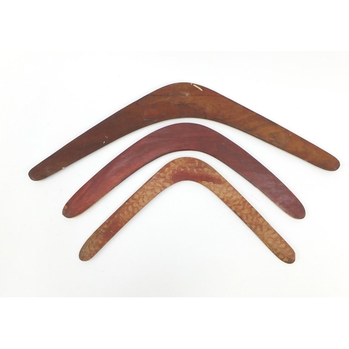 787 - Three hand painted Aboriginal wooden boomerangs