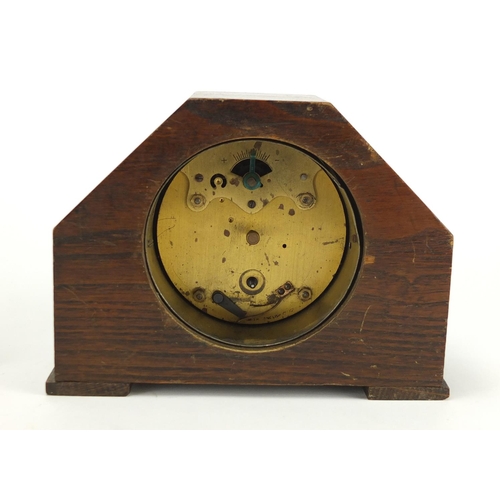 141 - Two Art Deco oak mantel clocks, one with eight day movement