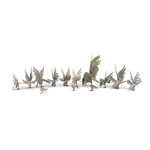 469 - Thirteen silver plated cockerels and pheasants, the largest 23cm high